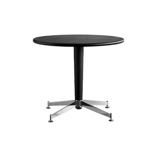 Black round table with a metallic base on a white background