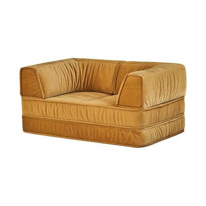 Gold-colored sofa on a white background